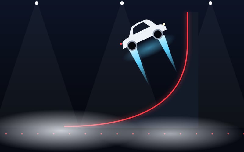 A car launching off the top of a giant curved ramp on blue jets at night